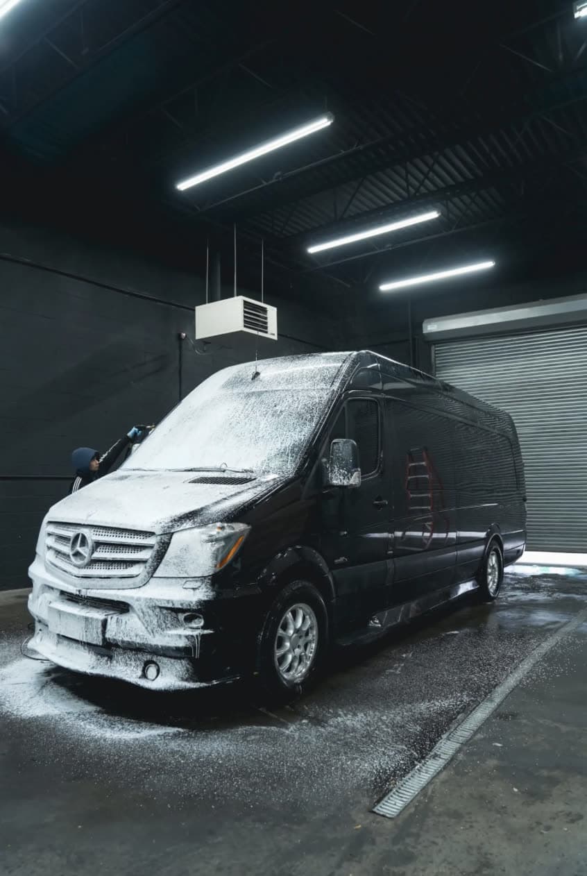 Mercedes-Benz Sprinter van in foam wash