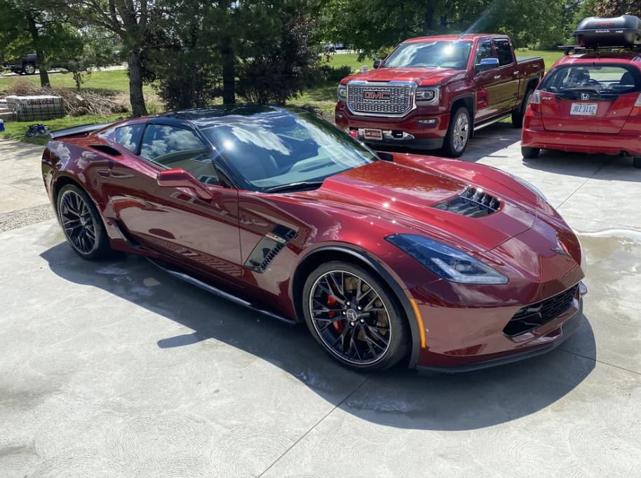 Red Corvette Z06 drying in the sun after a detail